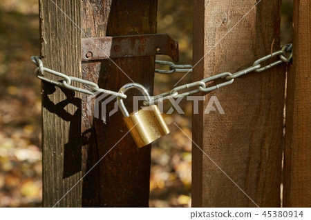 Old gate with padlock Old gate with padlock 45380914