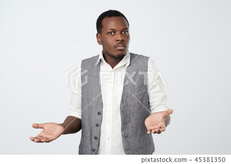 Young african man being at a loss Young african man being at a loss 45381350