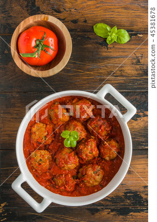 Meatballs cooked with tomato sauce Meatballs cooked with tomato sauce 45381678