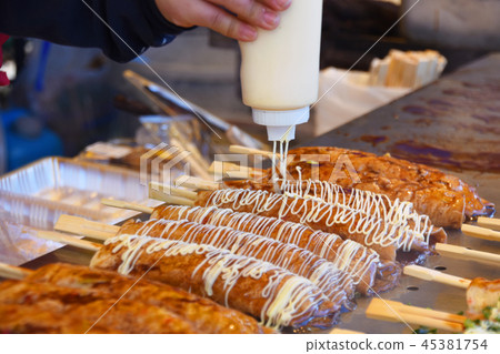 Mayonnaise with freshly made rice dumplings on a stall 45381754