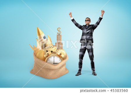 A businessman wearing a classic suit with stripes that resembles a burglar's outfit and a black eye A businessman wearing a classic suit with stripes that resembles a burglar's outfit and a black eye 45383560