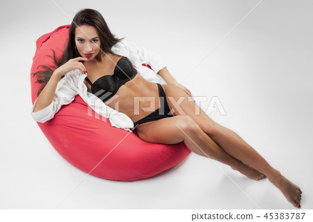 Gorgeous fitness model in bikini high angle view Gorgeous fitness model in bikini high angle view 45383787