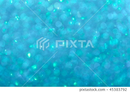 Blurred shiny blue background with sparkling light Blurred shiny blue background with sparkling light 45383792