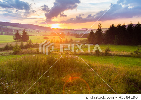 Countryside summer landscape with sunset 45384196