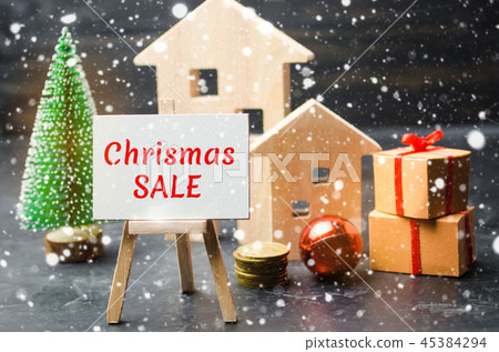 Wooden houses and Christmas tree 45384294