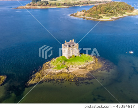 Aerial of the historic castle Stalker in Argyll in autumn, Scotland Aerial of the historic castle Stalker in Argyll in autumn, Scotland 45384617