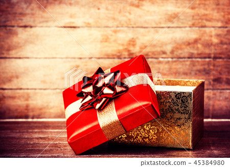 Retro gift on wooden table. 45384980