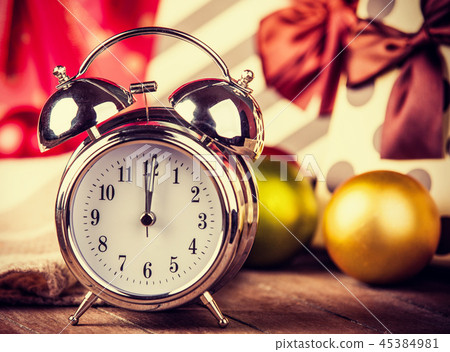 Vintage clock on christmas background Vintage clock on christmas background 45384981