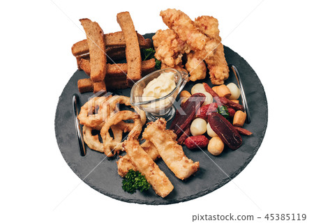 set of snacks for beer from crackers, onion rings, sausage 45385119