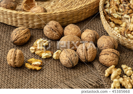 Walnuts on rustic natural burlap 45385668