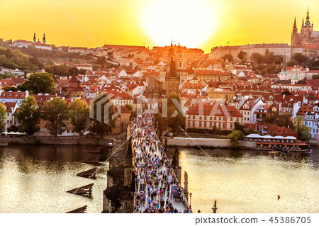 Panoramic view on Charles bridge and Prague sights at sunset Panoramic view on Charles bridge and Prague sights at sunset 45386705