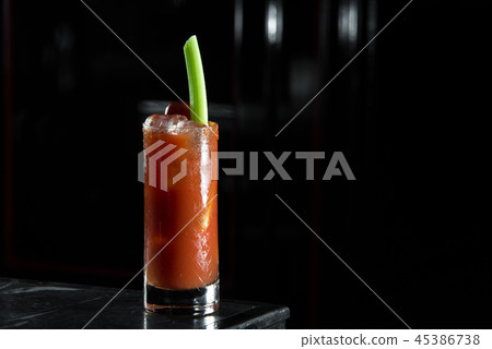 Bloody Mary on a bar desk. black background. Bloody Mary on a bar desk. black background. 45386738