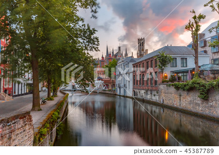 Green canal in Bruges, Belgium Tower Belfort and Church of Our Lady in Bruges 45387789