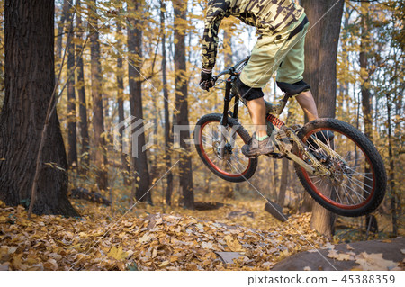 Photo of athlete man riding sports bike on track Photo of athlete man riding sports bike on track 45388359