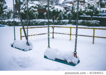 Snowy park, swing Snowy park, swing 45394051