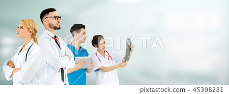 Doctor working in hospital with other doctors. 45398281