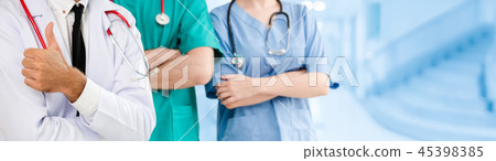 Doctor working in hospital with other doctors. Doctor working in hospital with other doctors. 45398385