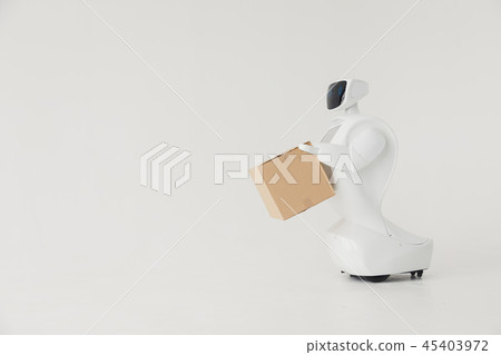 Humanoid autonomous robot with cardboard box in hand on white background. the robot delivers the 45403972