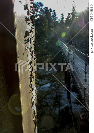 Pillar watching the suspension bridge for many years Pillar watching the suspension bridge for many years 45404659