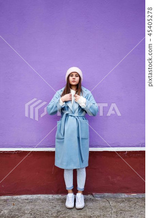 portrait of pleasent Hipster girl wearing warm portrait of pleasent Hipster girl wearing warm 45405278