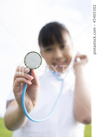 Hand of nurse sitting stethoscope 45405302