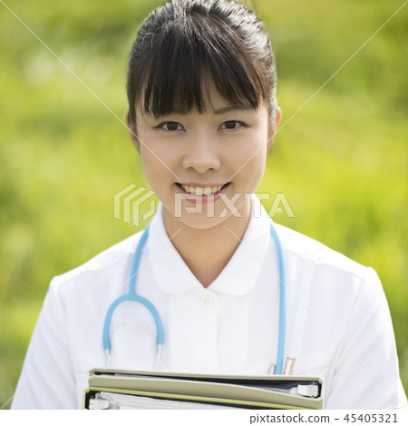 Nurse with files in the meadow Nurse with files in the meadow 45405321