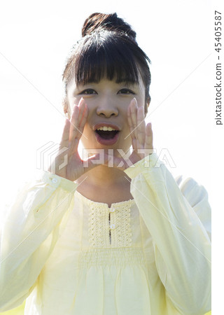 A woman putting her hand on her mouth 45405587