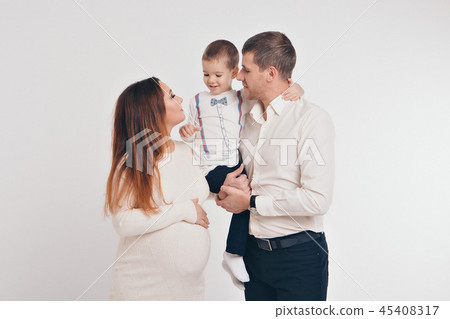 baby on the hands of parents on a white background. 45408317