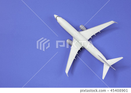 Photo of airplane isolated on empty blue background Photo of airplane isolated on empty blue background 45408901