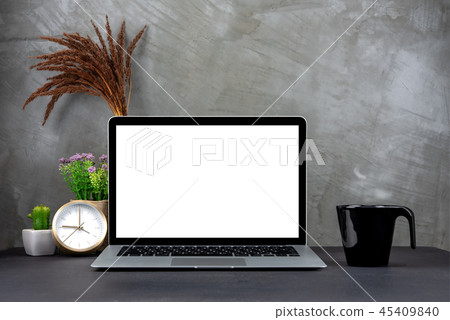 Laptop with blank screen on table Laptop with blank screen on table 45409840