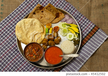 Maharashtrian lunch thali with Amras poli, India 45412502