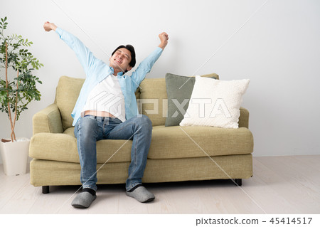 Young man stretching, holiday image Young man stretching, holiday image 45414517