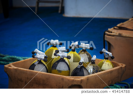 Cylinders with oxygen in container box on boat. Cylinders with oxygen in container box on boat. 45414788