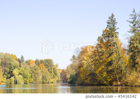Lake and trees in autumn park Lake and trees in autumn park 45416142
