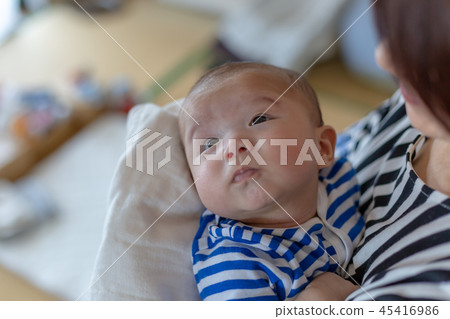 Smiling newborn baby Smiling newborn baby 45416986