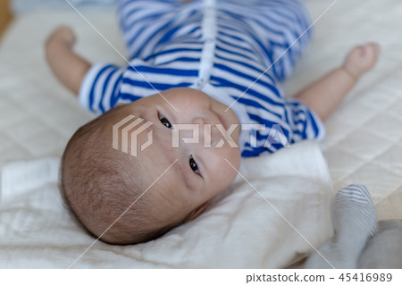 Smiling newborn baby Smiling newborn baby 45416989