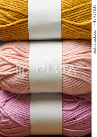ball of wool yarn for knitting on wood background ball of wool yarn for knitting on wood background 45417633