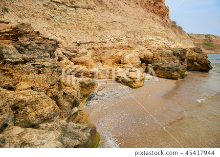 beautiful seaside landscape, closeup of stone  45417944