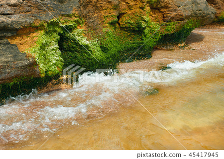 beautiful seaside landscape, closeup of stone  45417945