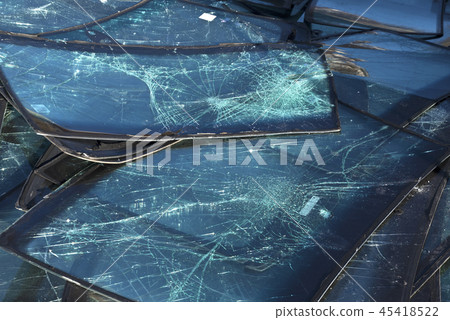 Pile of cracked car windscreens. Selective focus Pile of cracked car windscreens. Selective focus 45418522