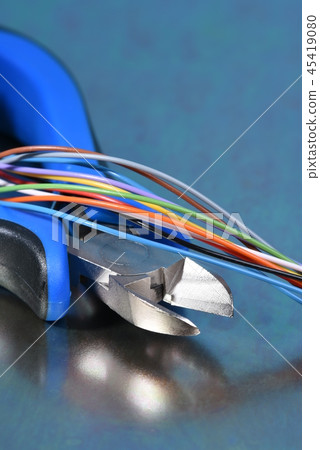 Tools for electrician and cables on metal surface Tools for electrician and cables on metal surface 45419080