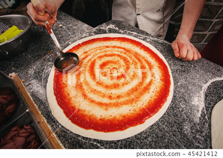 In the kitchen of chef. Master class on cooking pizza 45421412