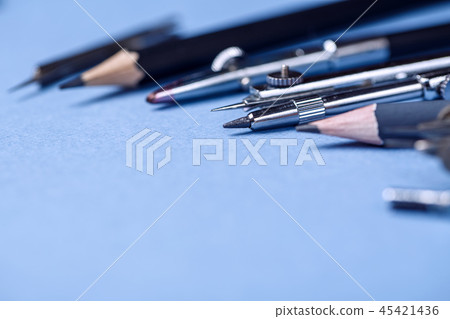 Tools for drawing on a blue background 45421436