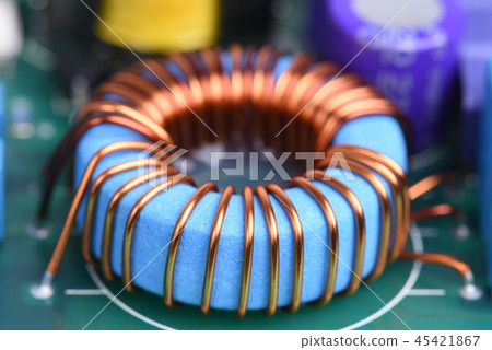 Inductor copper coil on circuit board Inductor copper coil on circuit board 45421867