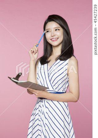 beautiful young woman announcing, shouting, speaking concept photo. attractive young woman isolated. 128 45427239