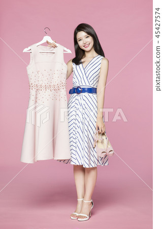 beautiful young woman shopping, sale concept photo. attractive young woman isolated. 068 45427574