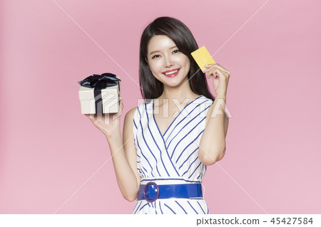 beautiful young woman shopping, sale concept photo. attractive young woman isolated. 065 45427584
