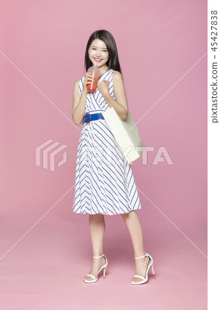 beautiful young woman shopping, sale concept photo. attractive young woman isolated. 024 45427838