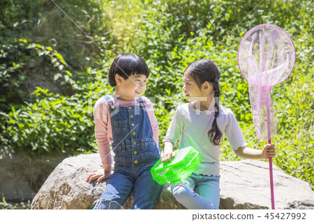 Cute little boy and girl harvesting together. Gardening, planting concept photo 194 Cute little boy and girl harvesting together. Gardening, planting concept photo 194 45427992