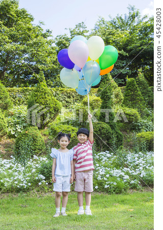 Cute little boy and girl harvesting together. Gardening, planting concept photo 340 Cute little boy and girl harvesting together. Gardening, planting concept photo 340 45428003